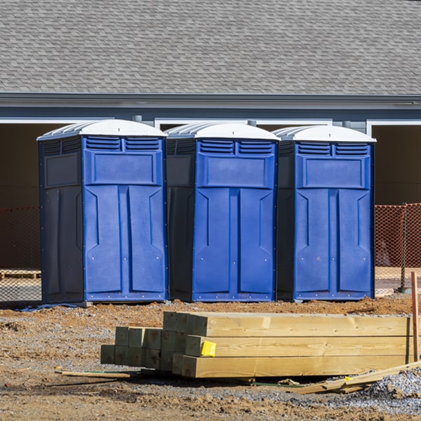 what is the cost difference between standard and deluxe porta potty rentals in Muscadine AL